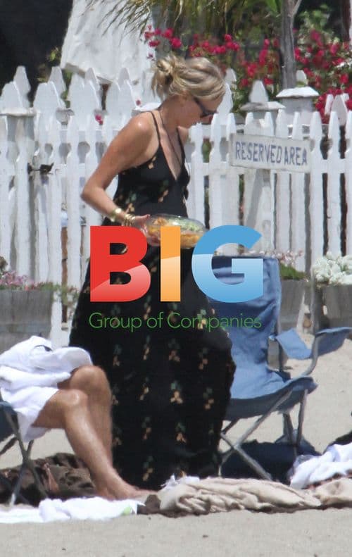 Kimberly Stewart Enjoys Beach Day with Family