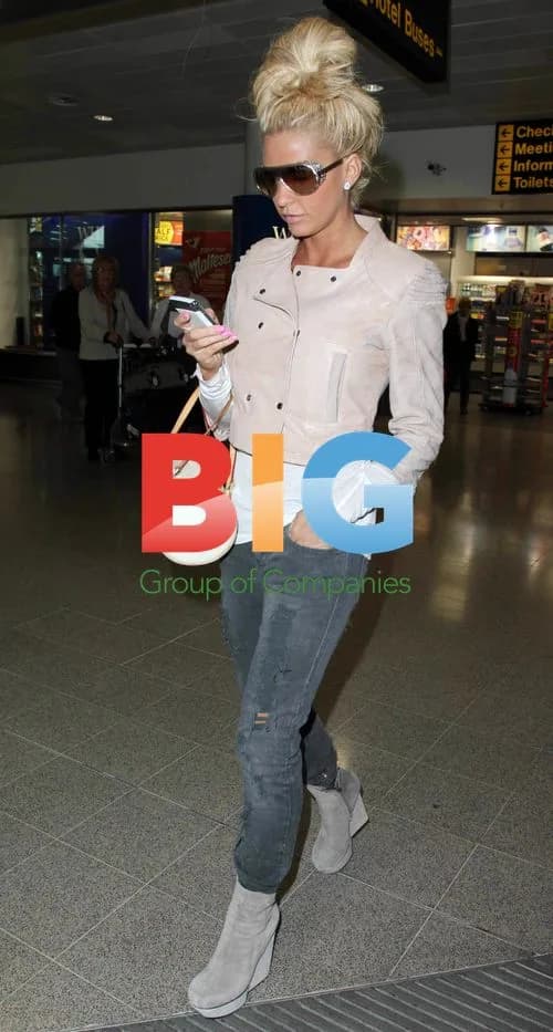 Katie Price Arrives at Manchester Airport