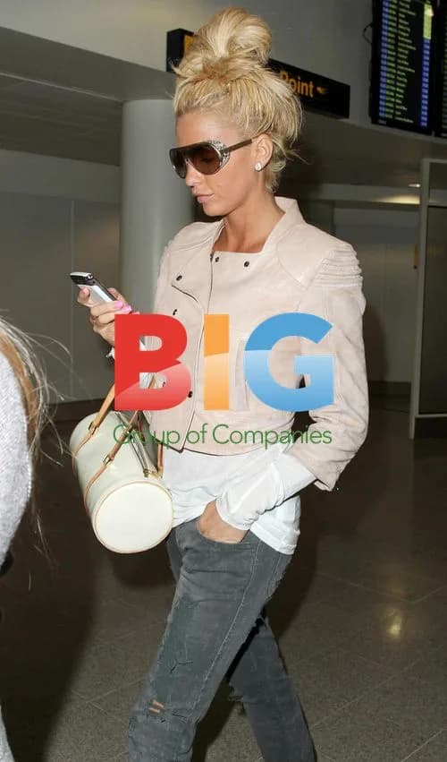 Katie Price arrives at Manchester Airport