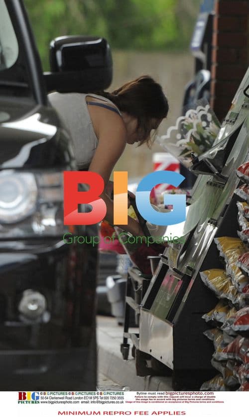 Kelly Brook gets petrol near home