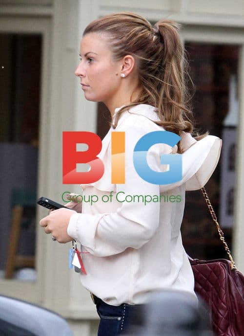 Coleen Rooney Shops in Louboutin Wedges