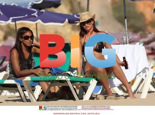 Amy Childs in Black Bikini in Portugal