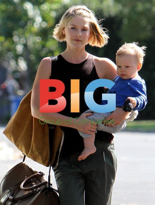 Ali Larter and son leaving home