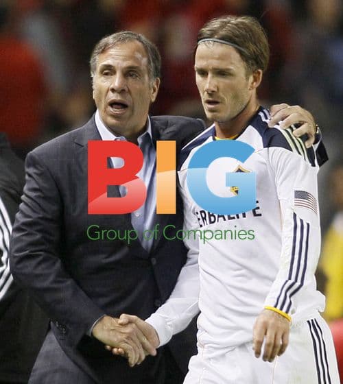 David Beckham collides with Dane Richards and Dax McCarty