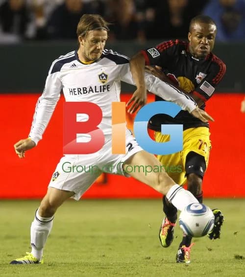 David Beckham collides with Dane Richards and Dax McCarty