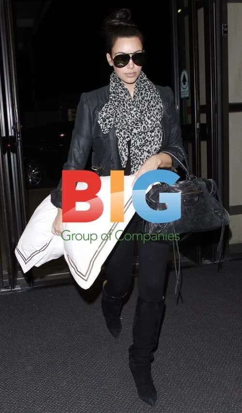 Kim Kardashian Boards Late Night Flight