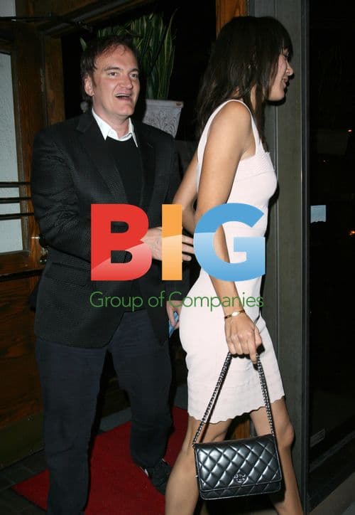 Quentin Tarantino with a lady