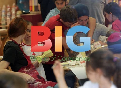 David Beckham with sons at pottery