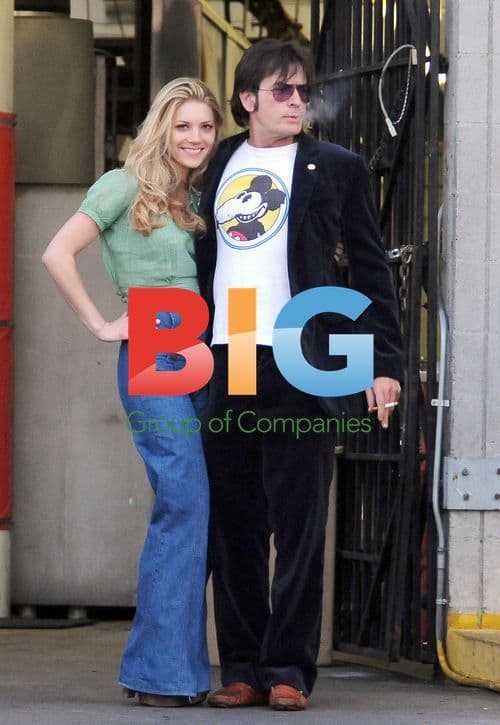 Charlie Sheen poses with Katheryn Winnick on film set