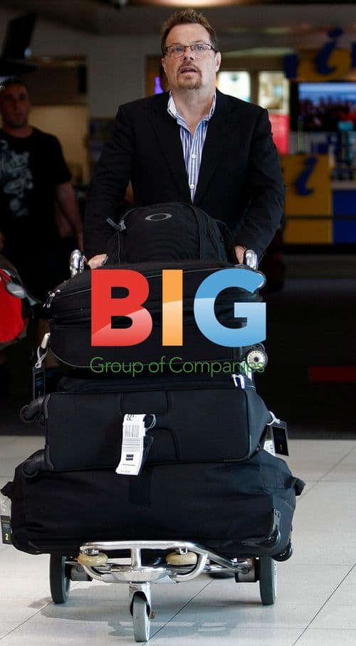 Eddie Izzard arrives at Perth Airport