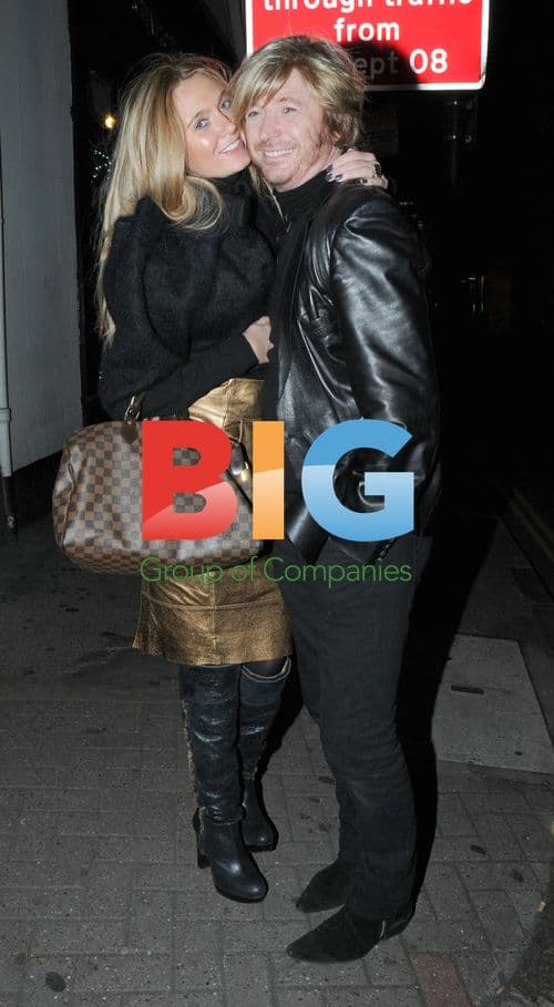 Hairdresser Nicky Clarke with girlfriend Kelly Simpkin in London