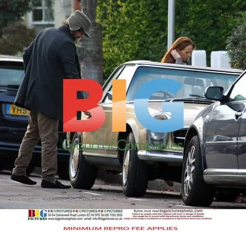 Jason Orange and Catherine Tate leave in Mercedes