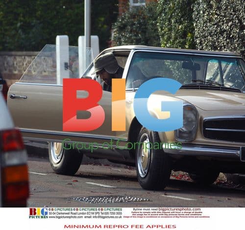 Jason Orange and Catherine Tate leave in vintage car