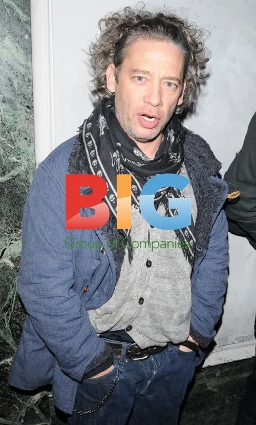 Actor Dexter Fletcher Out in London