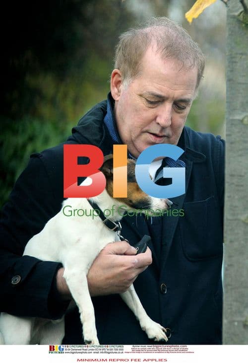 Michael Barrymore takes dog for walk in London