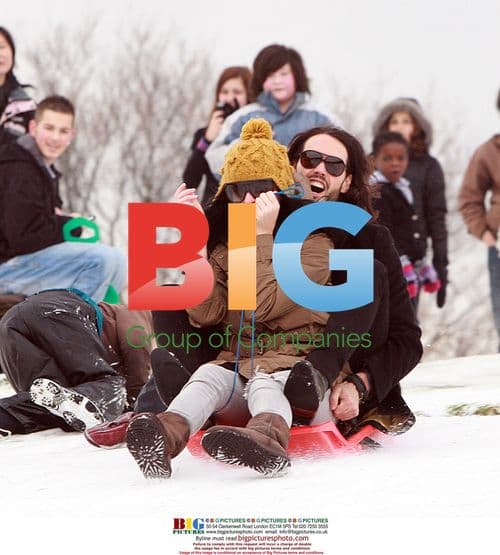 Russell Brand and Katy Perry Sledding