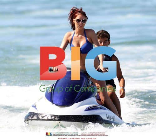 Amy Childs Enjoys the Sun in Blue Bikini