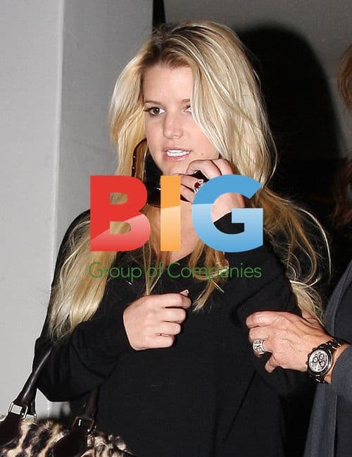 Jessica Simpson Spotted at Airport with Mom