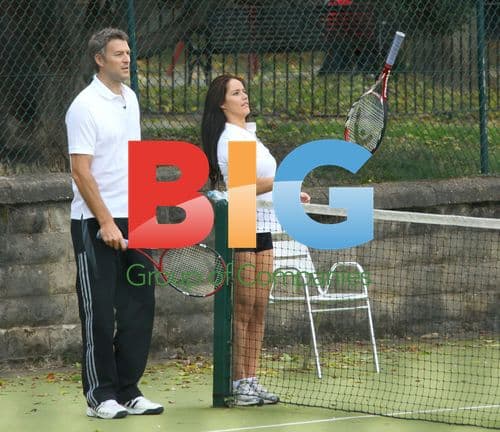 Dan Lobb and Katya Virshilas practice dance moves during tennis game