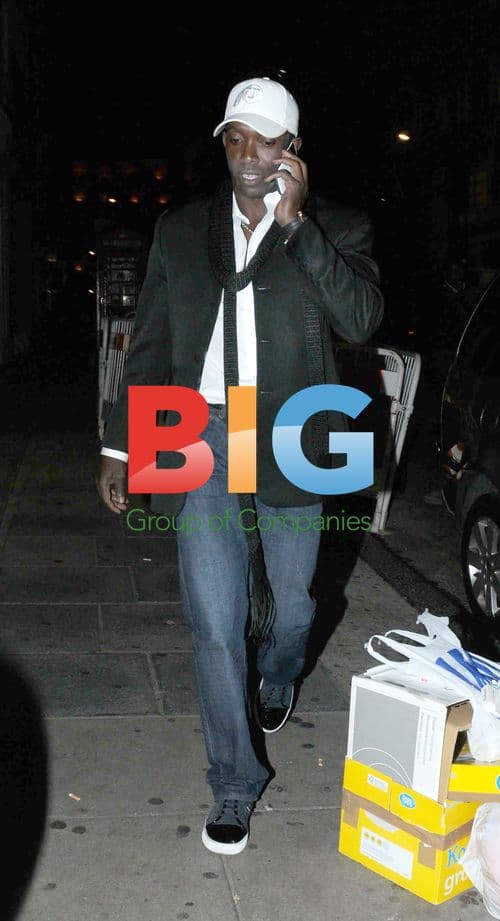 Footballer Dwight Yorke Out with Girlfriend in London