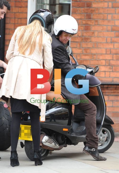 Nicky Clarke Leaves Salon on Motorcycle