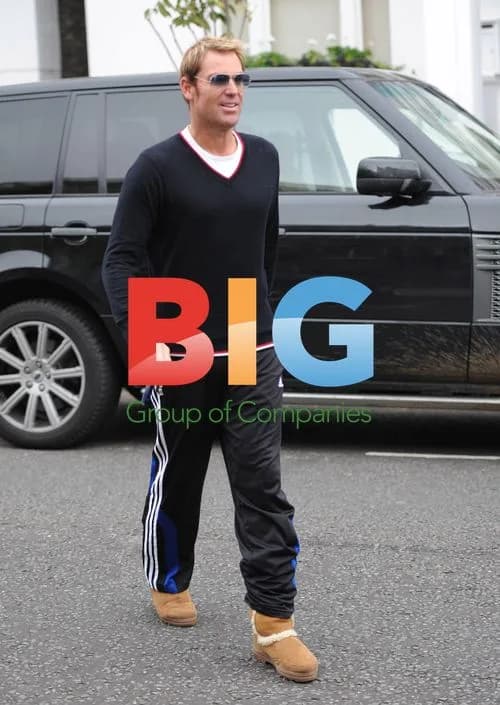 Shane Warne Arrives at Liz Hurley's Home in Uggs