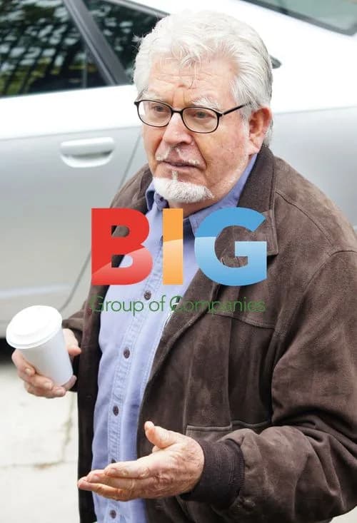Rolf Harris Exits Car With Coffee