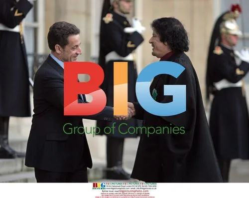 Sarkozy Greets Gaddafi in Paris