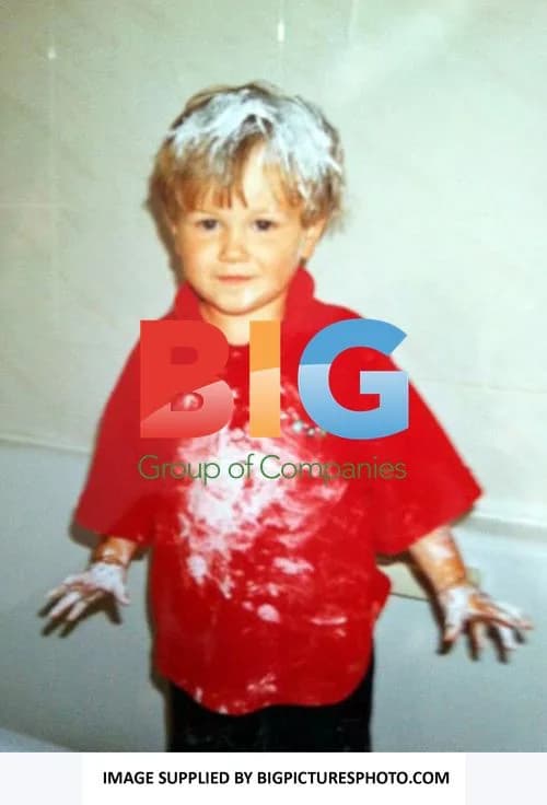 Andy Merry from X Factor's The Risk as a Child