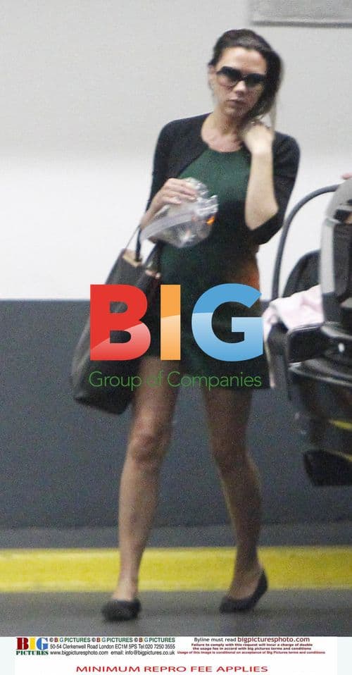 Victoria Beckham Leaves LA Office with Baby Harper