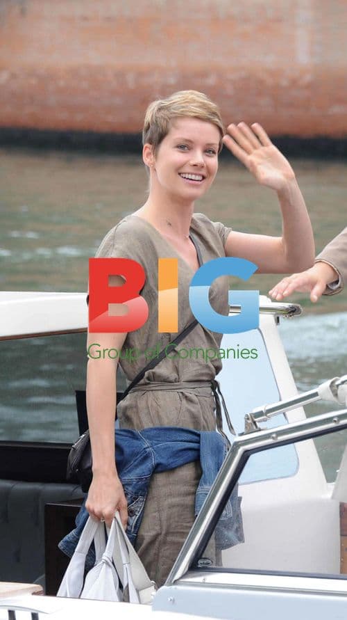 Andrea Osvart takes sea taxi in Venice