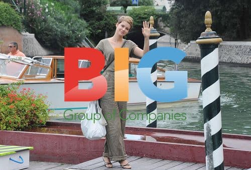 Andrea Osvart takes sea taxi in Venice