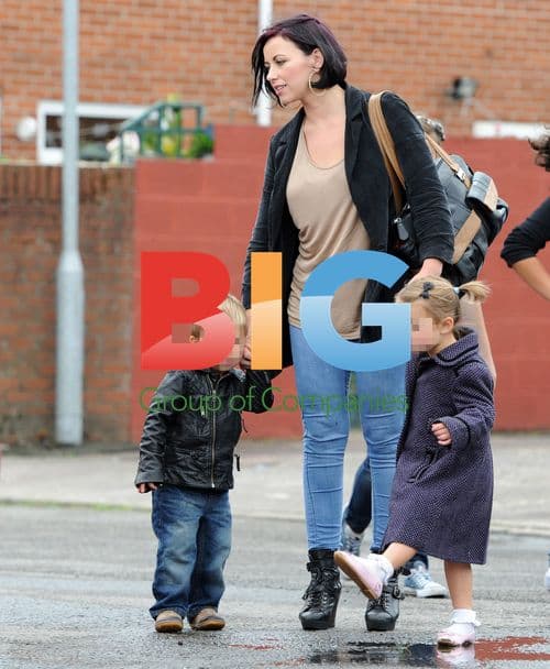 Charlotte Church and children out in rain