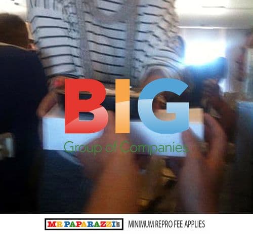 Cheryl Cole serves dinner to soldiers