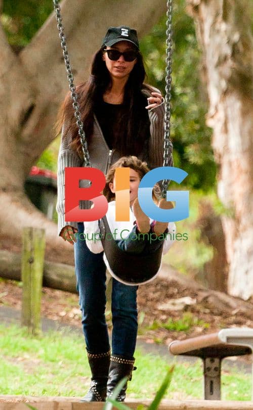 Erica Packer plays with kids in Sydney