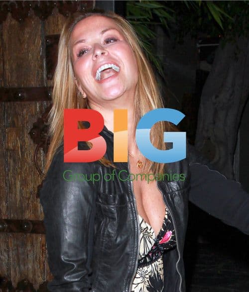 Anastacia Laughing with Friends at Koi Restaurant