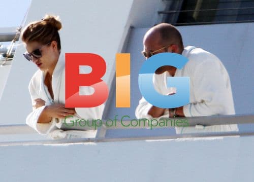 Jason Statham and Rosie Huntington-Whiteley relax on balcony