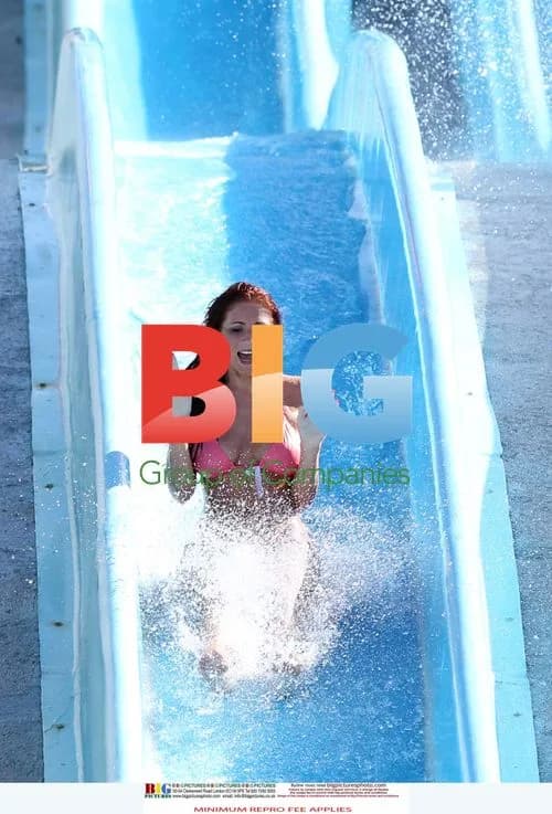 Amy Childs Rides Waterslide in Pink Bikini