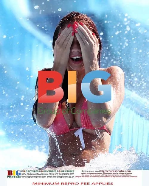 Amy Childs in Pink Bikini on Waterslide