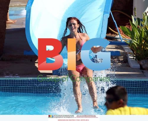 Amy Childs in Pink Bikini on Waterslide