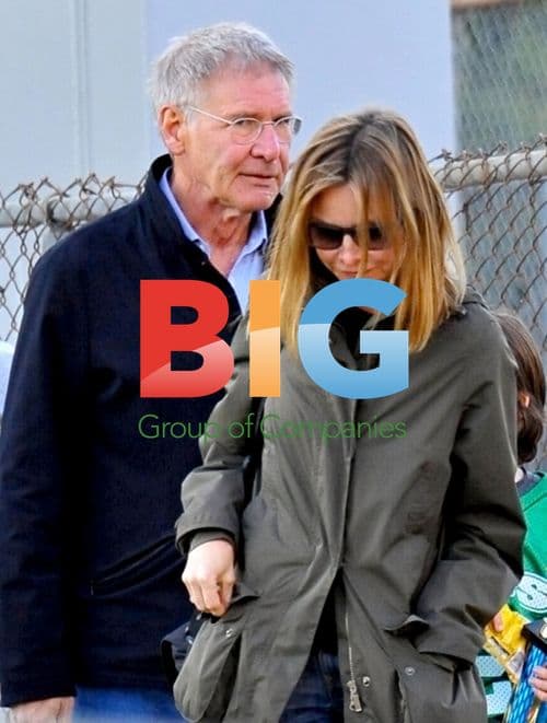 Harrison Ford and Calista Flockhart at son's football game
