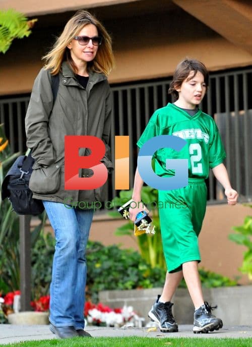 Harrison Ford and Calista Flockhart at son's football game