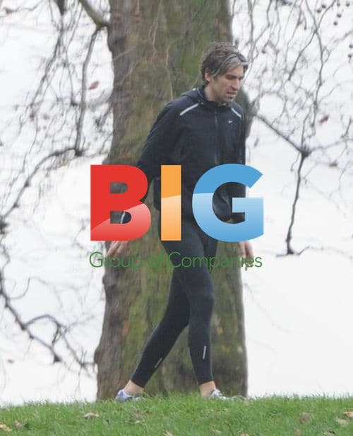 George Lamb Exercises with Trainer and Dog