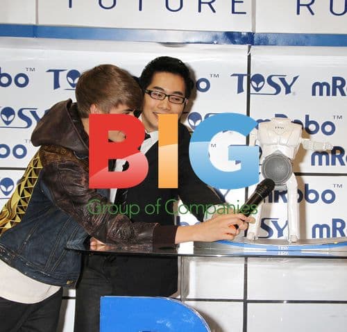 Justin Bieber unveils TOSY mRobo at CES