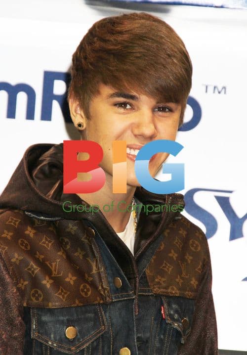 Justin Bieber at CES with Robots