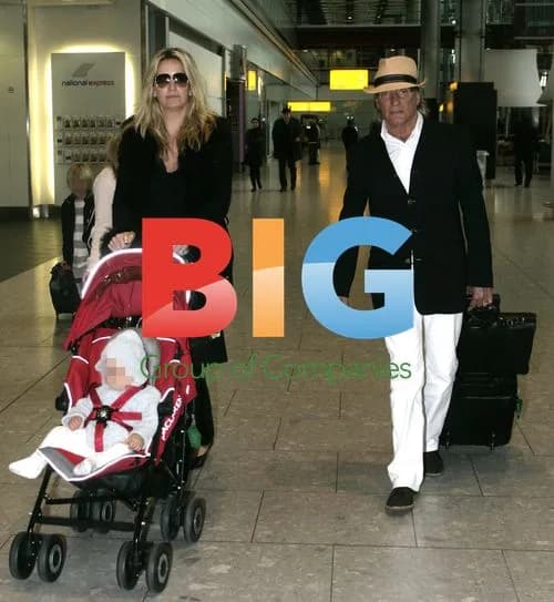 Rod Stewart and Family Arrive at Heathrow