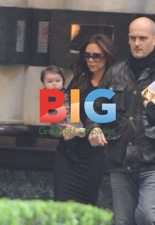 Victoria Beckham Leaves Hotel with Baby