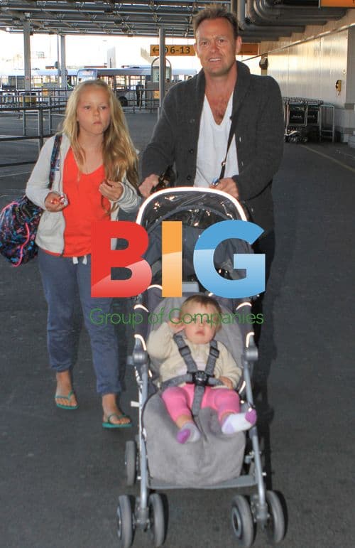 Jason Donovan Arriving at Heathrow with Kids