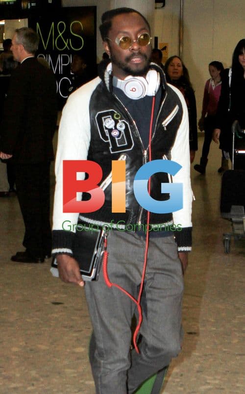 Will.i.Am Arriving at Heathrow
