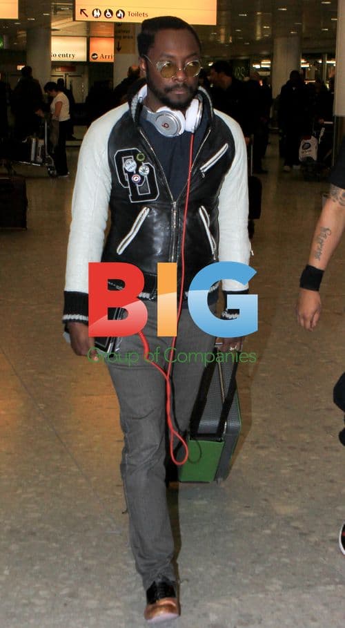Will.i.Am Arrives at Heathrow Airport